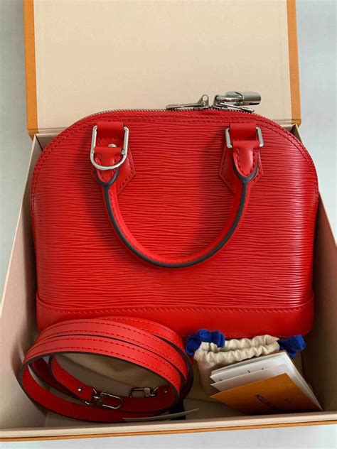 louis vuitton alma bb red